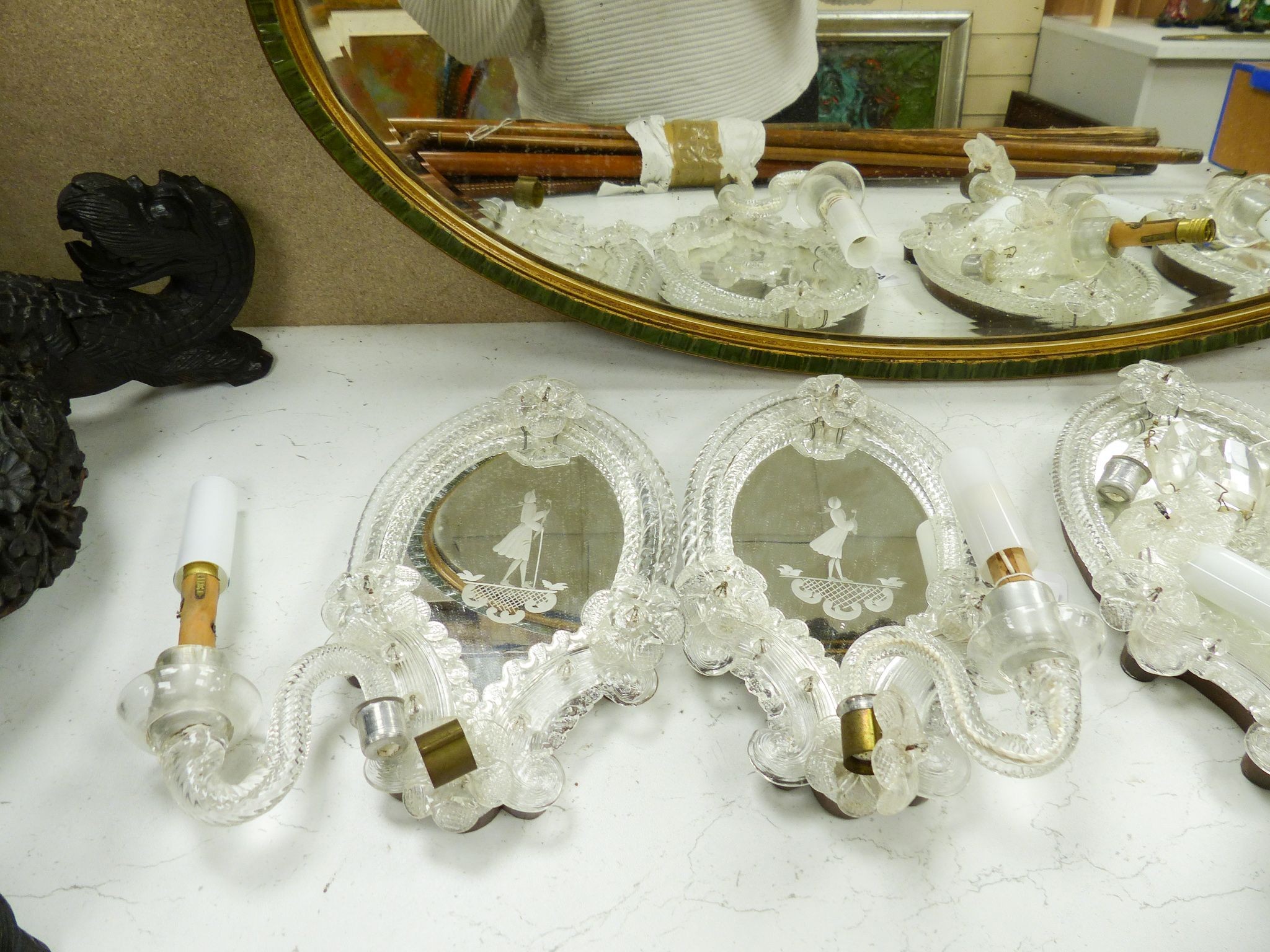 A set of four Venetian glass mirrored girandole mirrors, 25cm